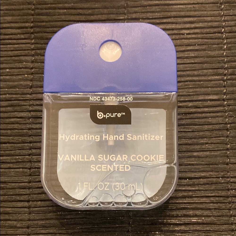 Blue Hand Sanitizer in Clear Container with spray Cap